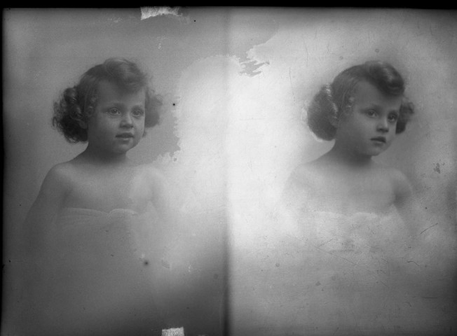 Double cliché du visage d'un enfant : plaque de verre 13x18 cm.